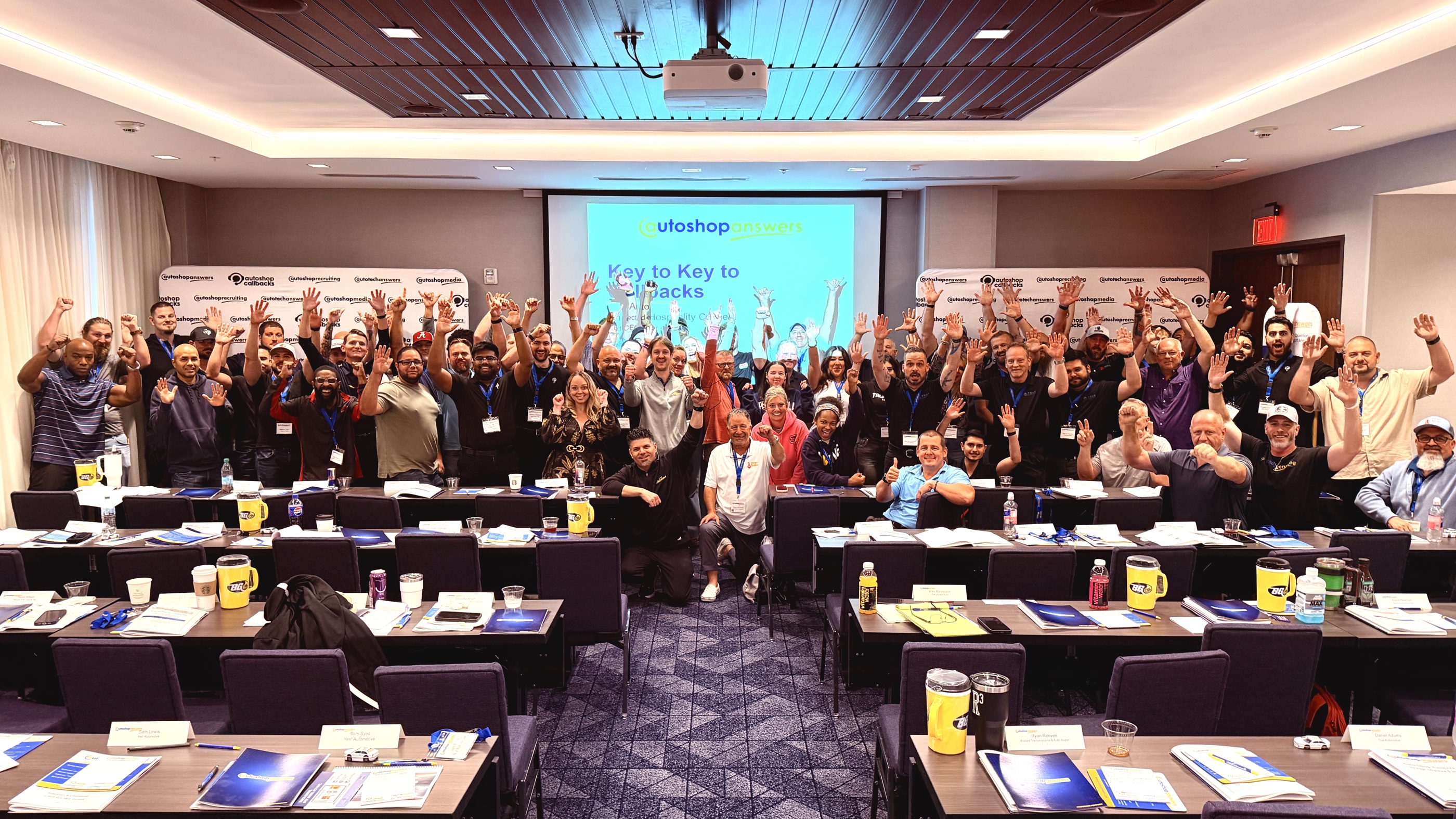 Key2Key Weekend shop owners cheering together after training in Houston