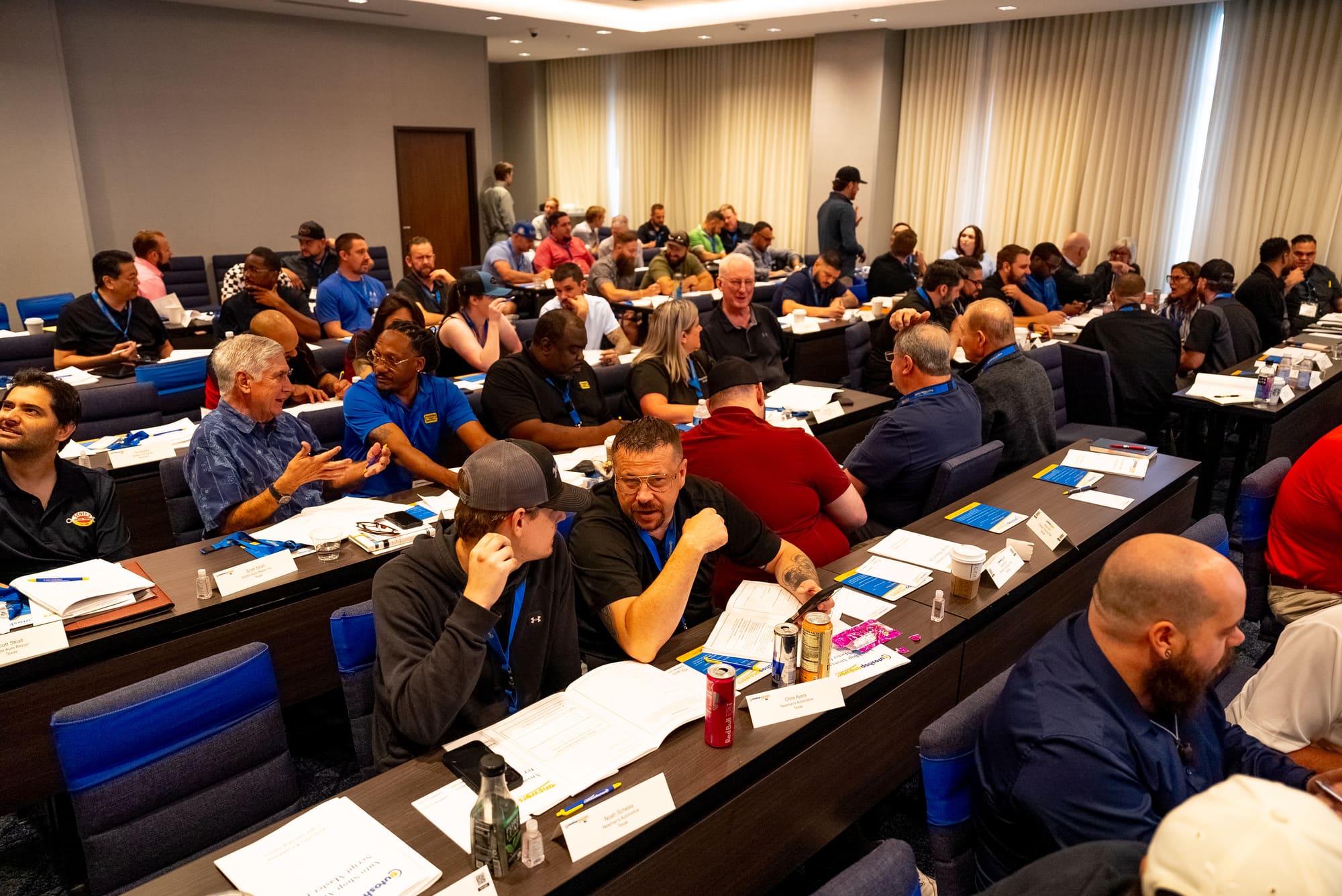 Owners working through the model together at training tables